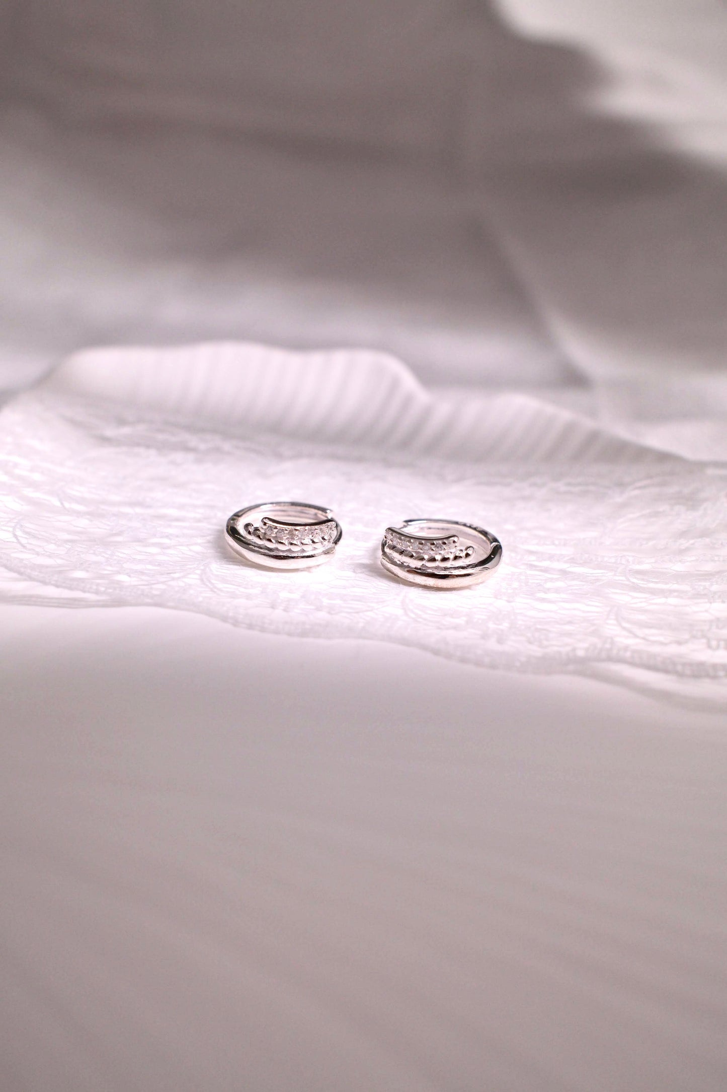 Triple huggie earrings