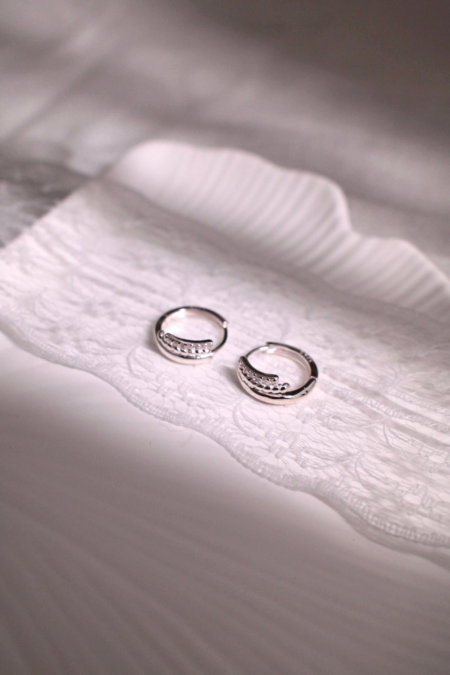 Triple huggie earrings