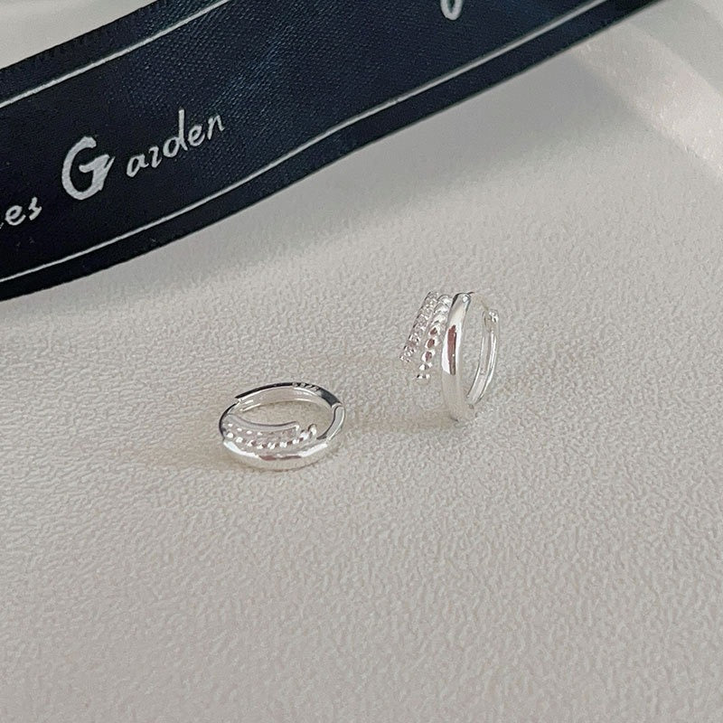 Triple huggie earrings